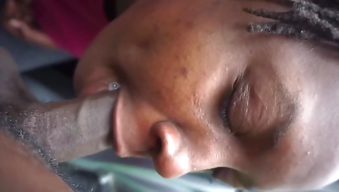 Ebony babe with a tight throat eats the deepthroat cock