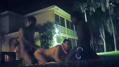 Ebony milf fucked by a huge black dick in an outdoor threesome