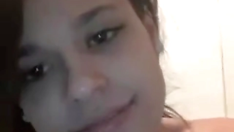 Sexy brunette with a tattooed ass sticks her body out