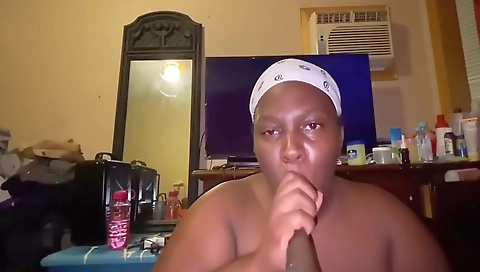 A sexy ebony milf with a nice head sucks and rides a huge black cock