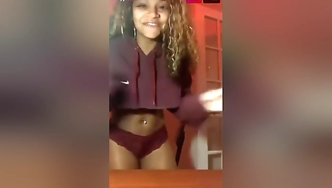 Ebony solo chick with a sexy body is shown on webcam