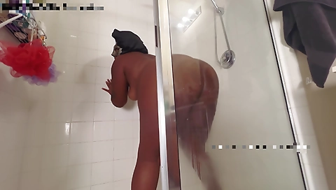 Ebony teen in lingerie in the shower with her pussy