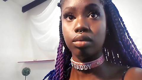 Ebony teen with a sexy body is taking a photo of herself