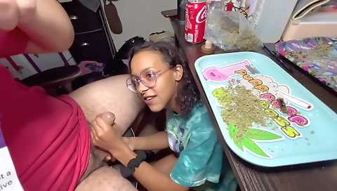 Ebony girl gives a blow job to her black boyfriend