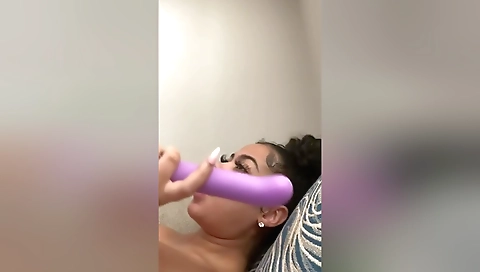 Ebony teen fucks herself with a dildo in homemade solo video