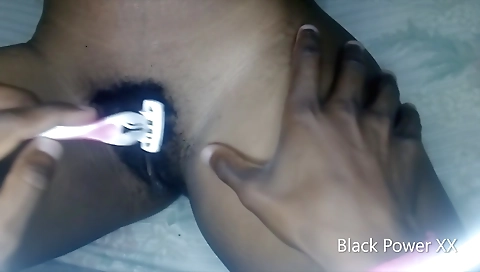 Ebony girl is stripping naked and sharing her private holes