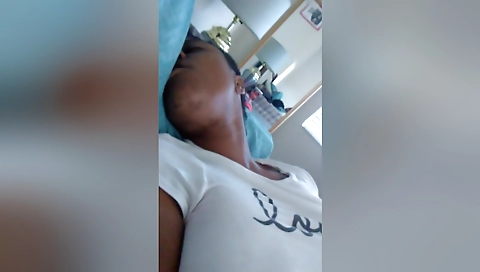 Ebony slut is on her side and she's getting a cock in