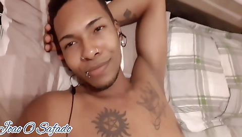 Ebony beauty with tattooed ass rides a dildo on back